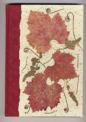 Libro dei vini in tela e carta a mano con inclusioni di fiori pressati
